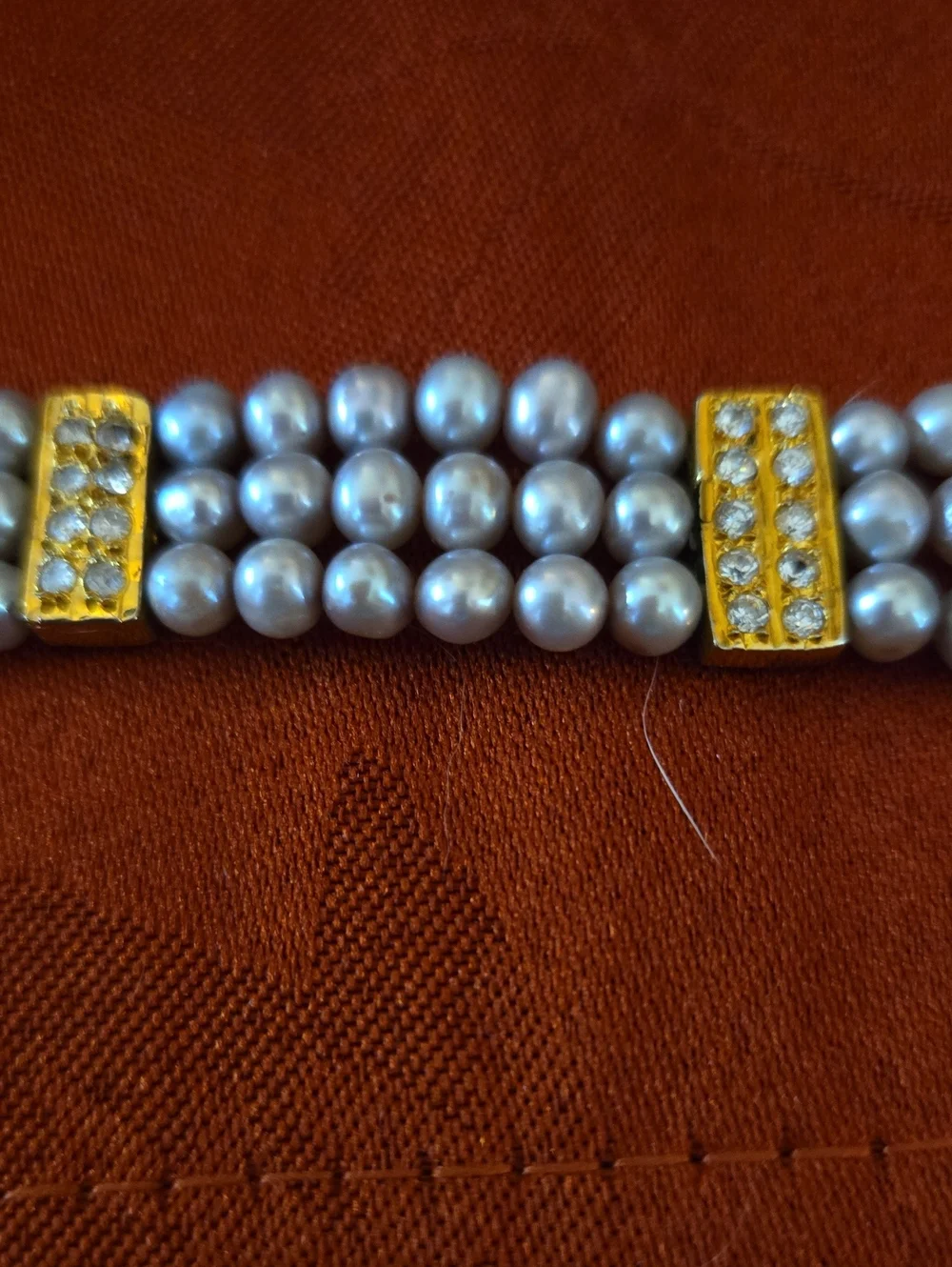 Triple-Row Pearl Bracelet with Gold Crystal Accents